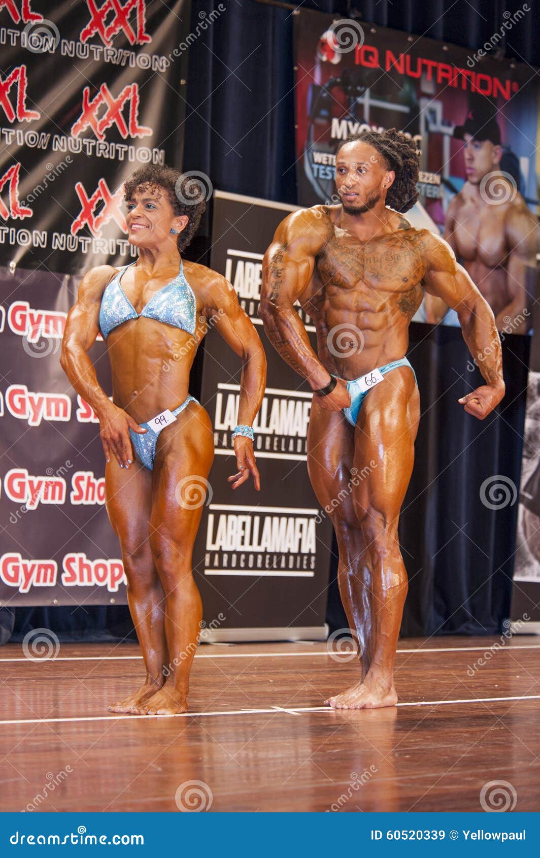 bodybuilding duo side chest pose stage schiedam netherlands april floor van putten grego francisca show their best 60520339