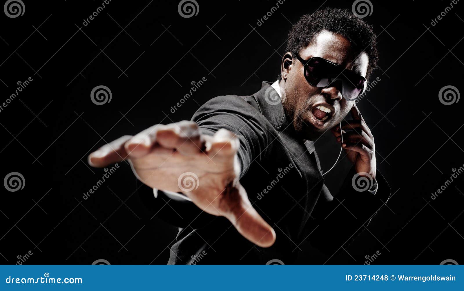 Bodyguard black man stock photo. Image of communication 23714248