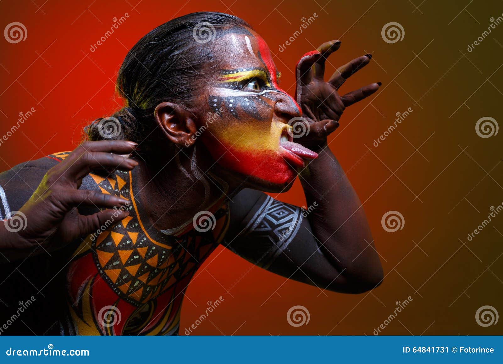 bodypainting. woman painted with ethnic patterns