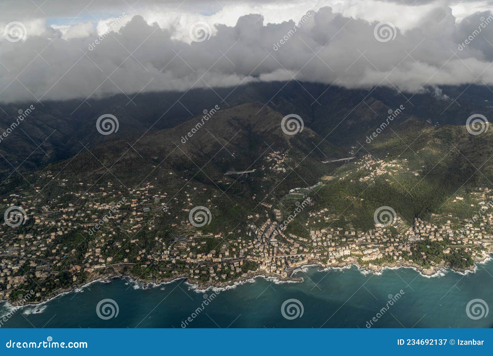 bogliasco village genoa aerial view before landing on cloudy day