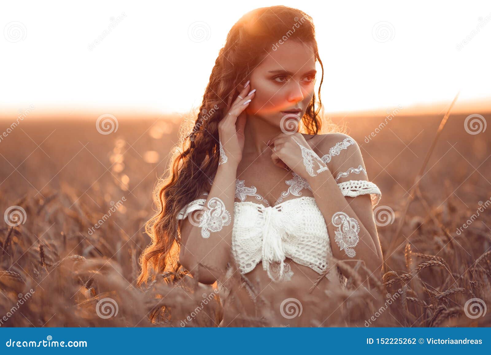 Boho Chic Style. Portrait of Bohemian Girl with White Art Posing Over Wheat Field Enjoying at Sunset. Outdoors Photo Stock Photo - Image of bridal, fashion: 152225262 Boho Chic Style. Portrait of Bohemian Girl with White Art Posing Over Wheat Field Enjoying at Sunset. Outdoors Photo Stock Photo - Image of bridal, fashion: 152225262