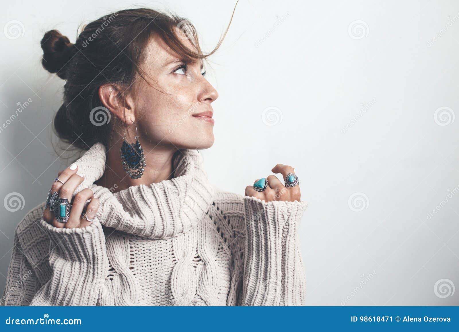 boho jewelry and woolen sweater on model