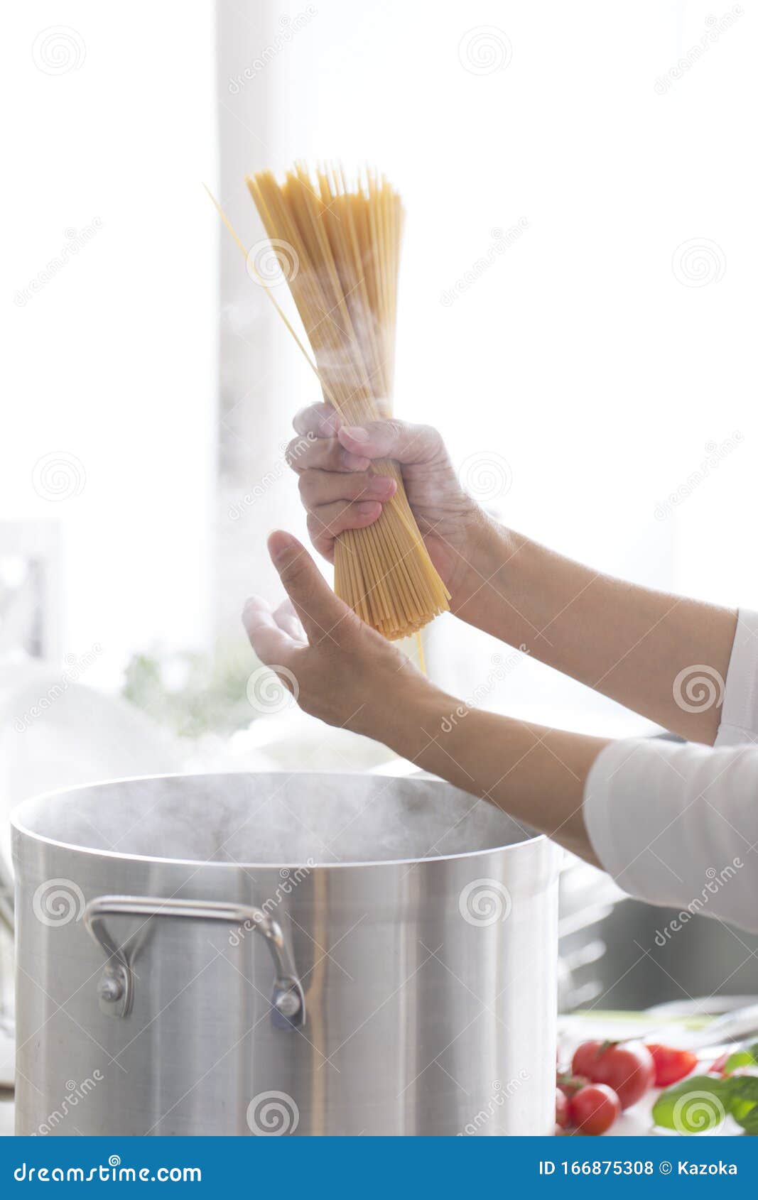 Boil pasta in a pot stock photo. Image of body, spaghetti 166875308