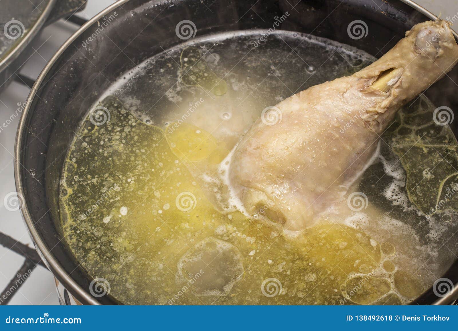 Boiled Chicken in a Pot Broth Closeup with Blurred Background and