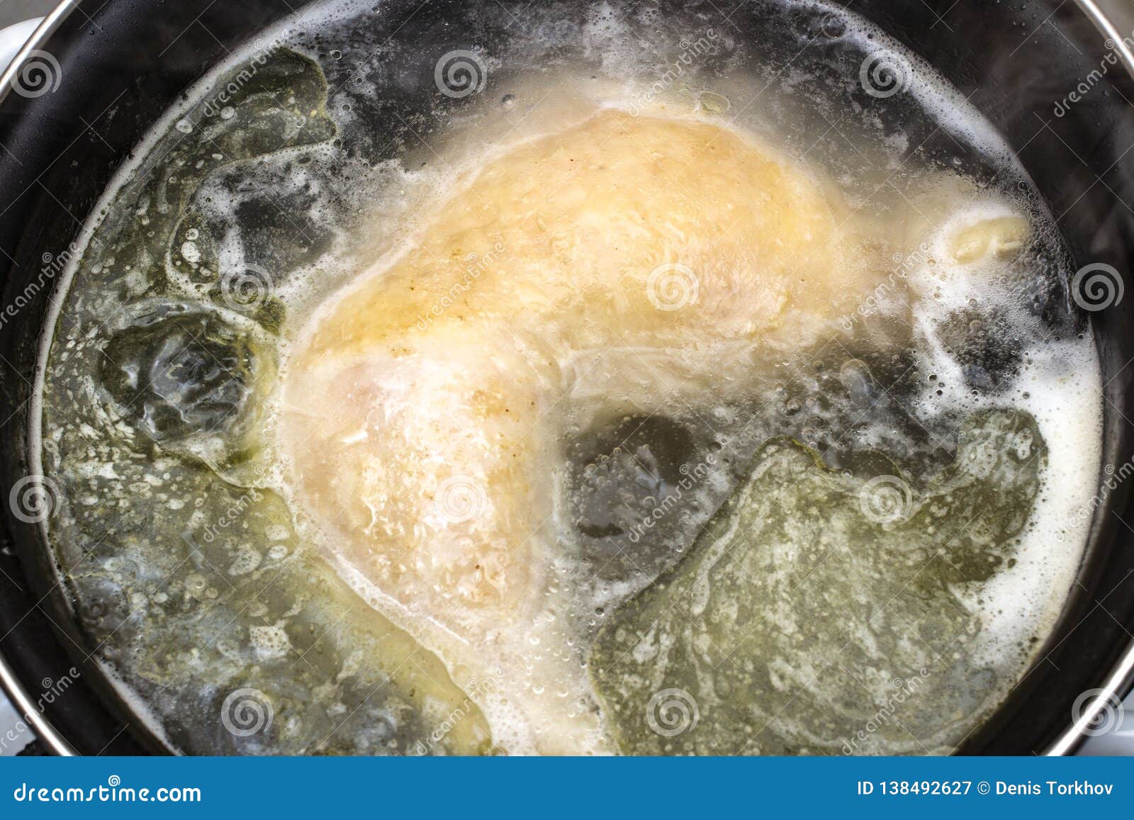 Boiled Chicken in a Pot Broth Close-up with Blurred Background and