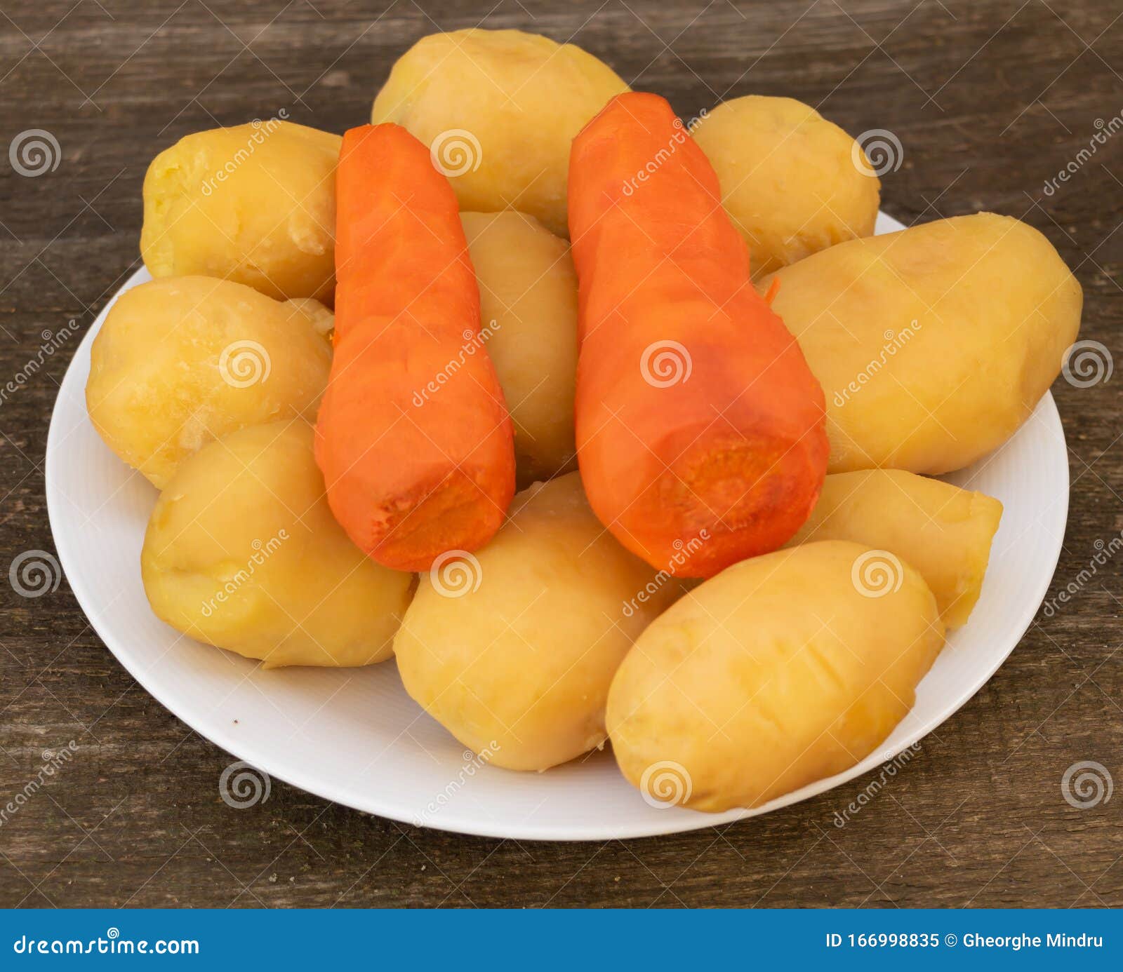 Boiled Potatoes and Carrots Cooking Process. Natural Food Stock Image