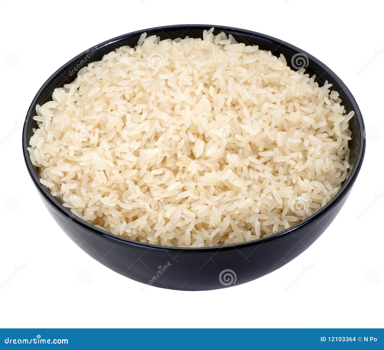 boiled rice in a black bowl close-up 