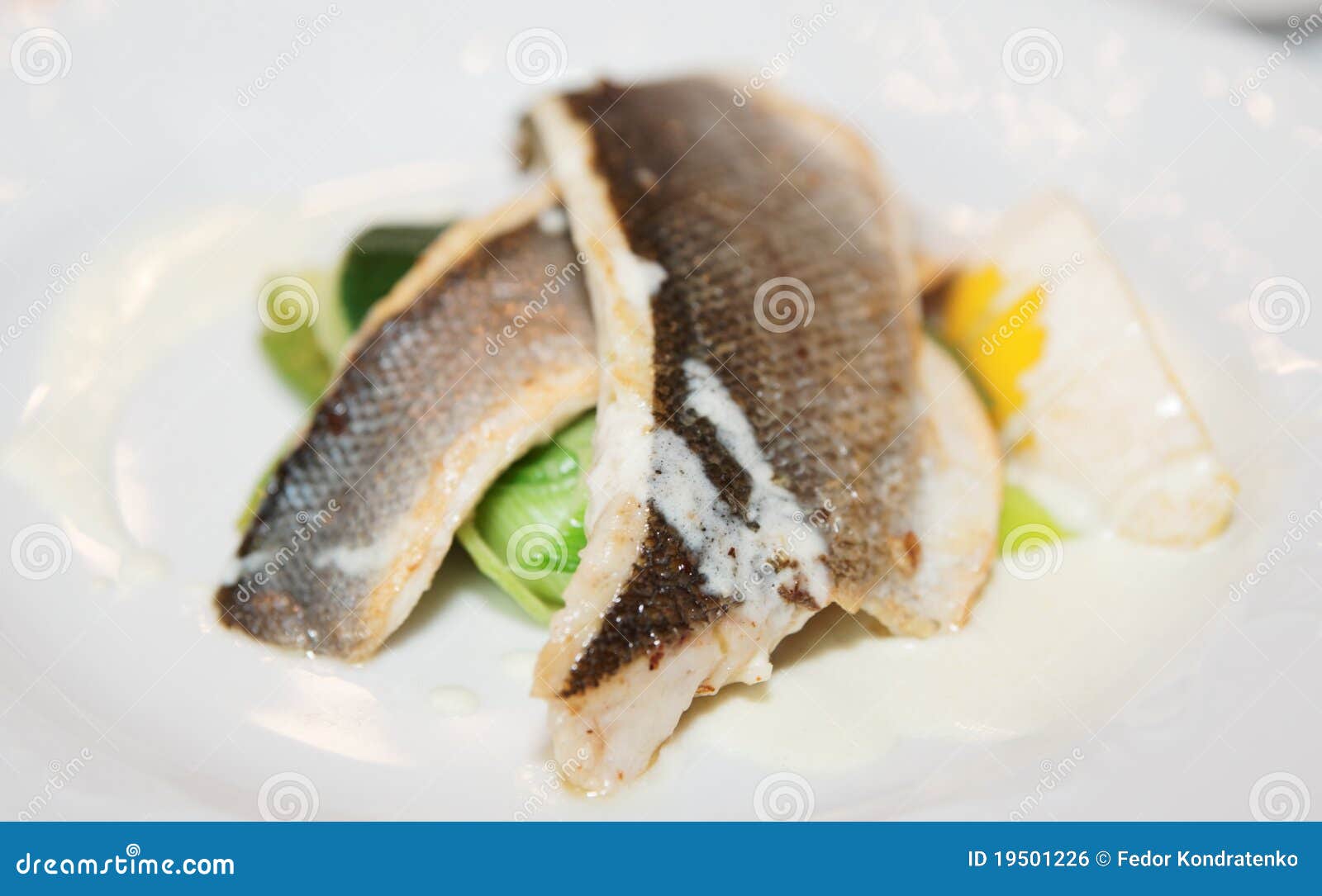 Boiled seabass with steamed vegetables - healthy meal