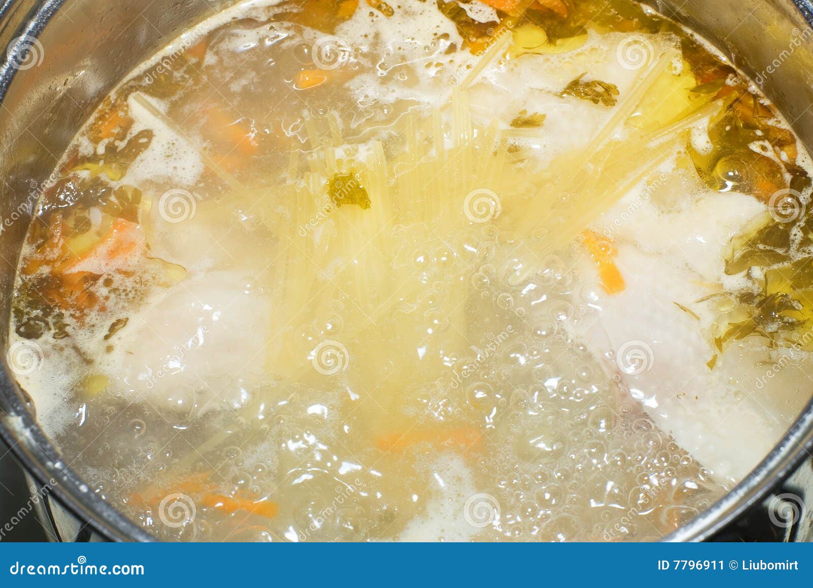 Boiling Chicken Soup with Pasta and Greens Stock Image - Image of food
