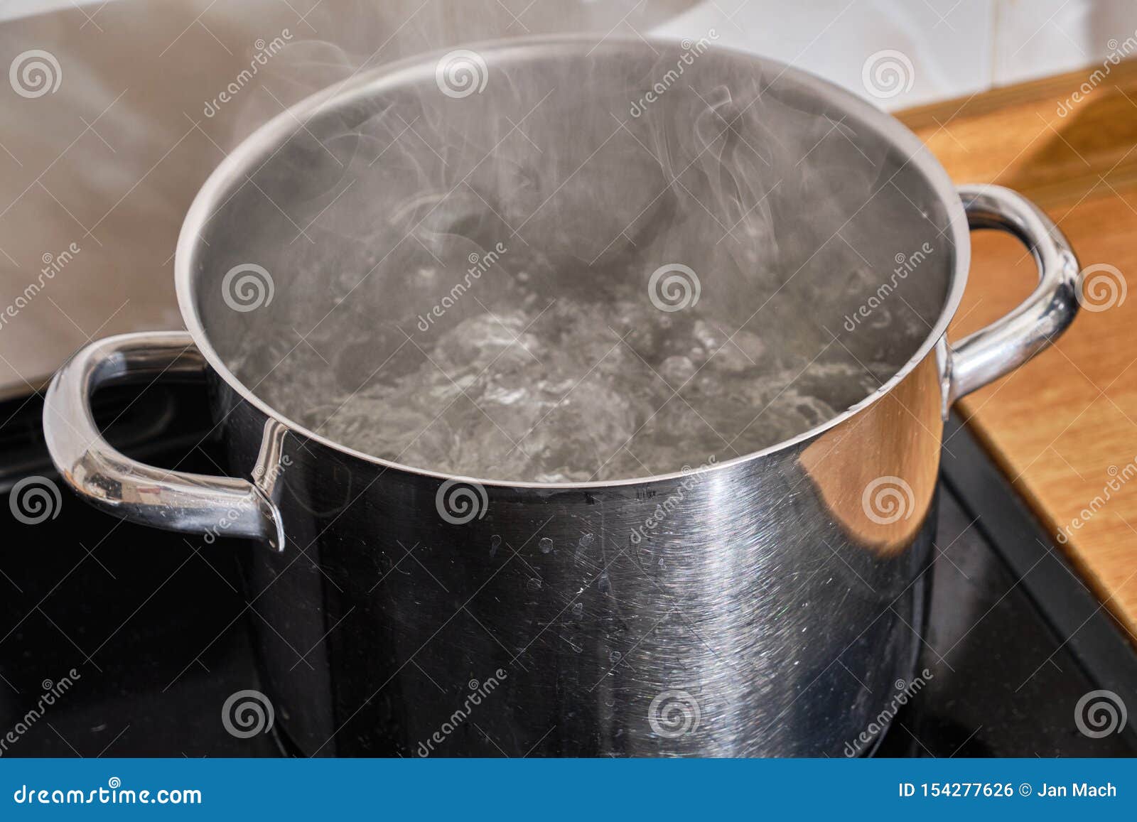 Boiling Water in a Cooking Pot on the Cooker Stock Photo - Image of  kitchenware, chef: 111312522
