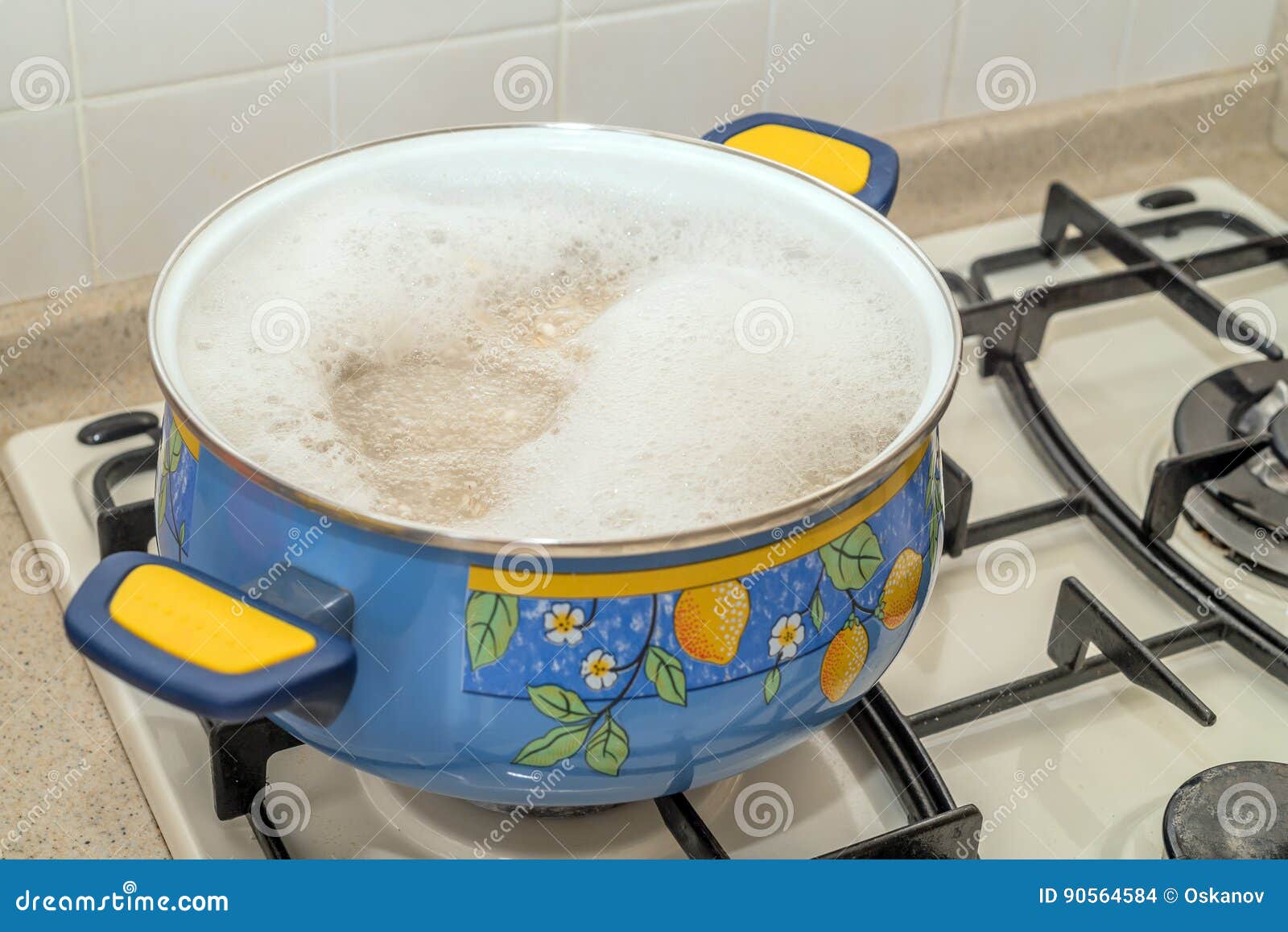 Boiling water in pan stock photo. Image of orange, liquid 90564584