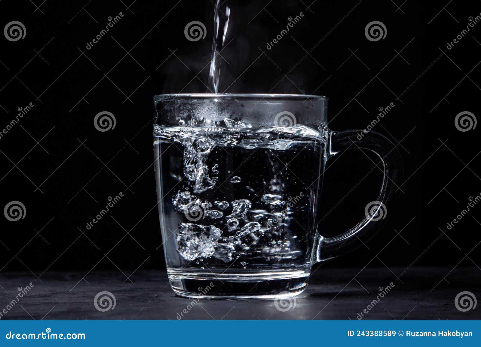 Boiling Water is Poured into a Glass on a Black Background. Stock Image Image of drop, boiling
