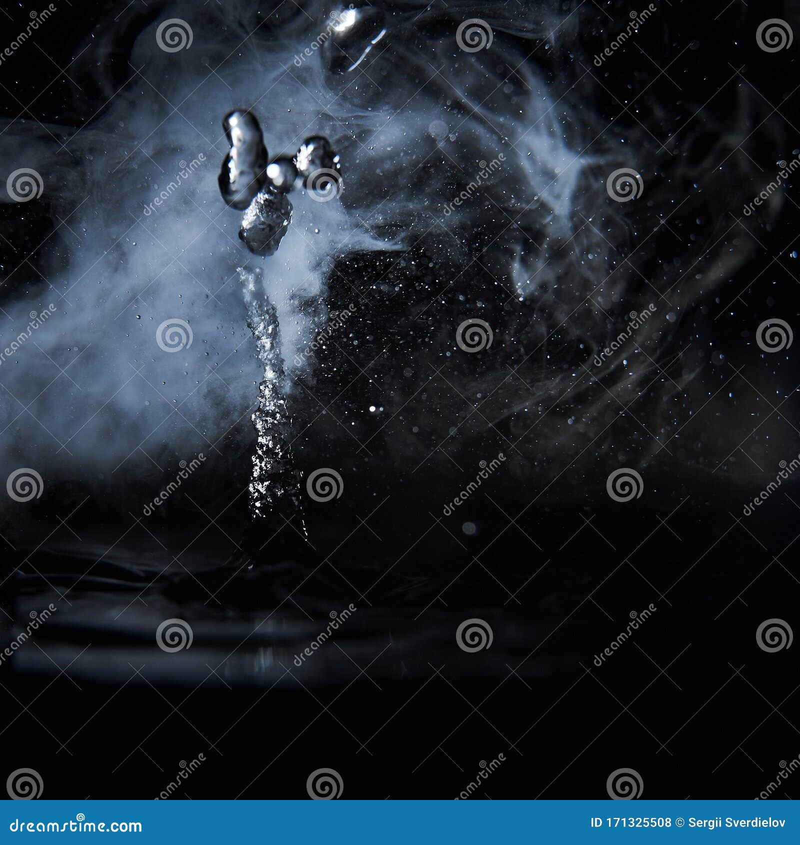 Boiling Water Splash with Steam on Black Background Closeup Stock Photo