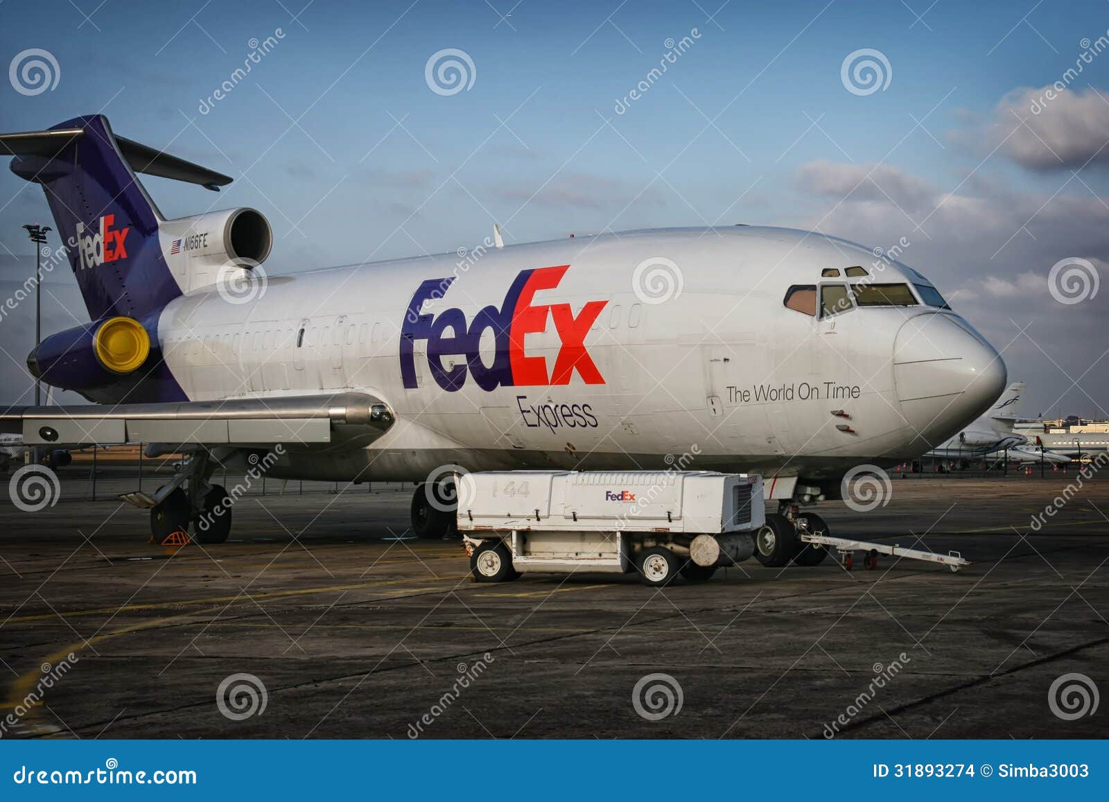 HD wallpaper grey and white FedEx passenger plane clouds flight the  plane  Wallpaper Flare