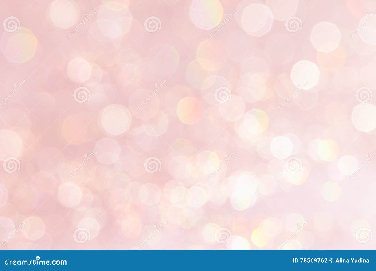 bokeh soft pastel pink background with blurred golden lights.