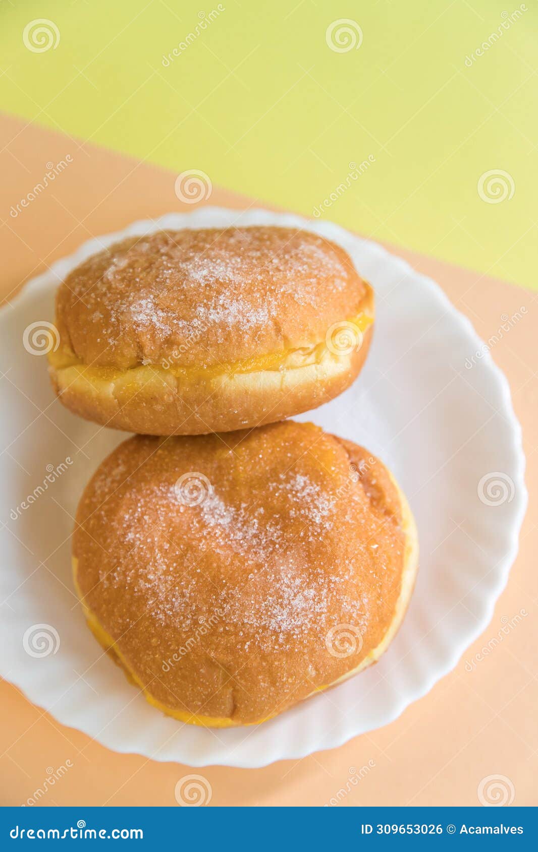 bolas de berlim, berliner or donuts filled with egg jam, a very popular dessert in portuguese pastry shops