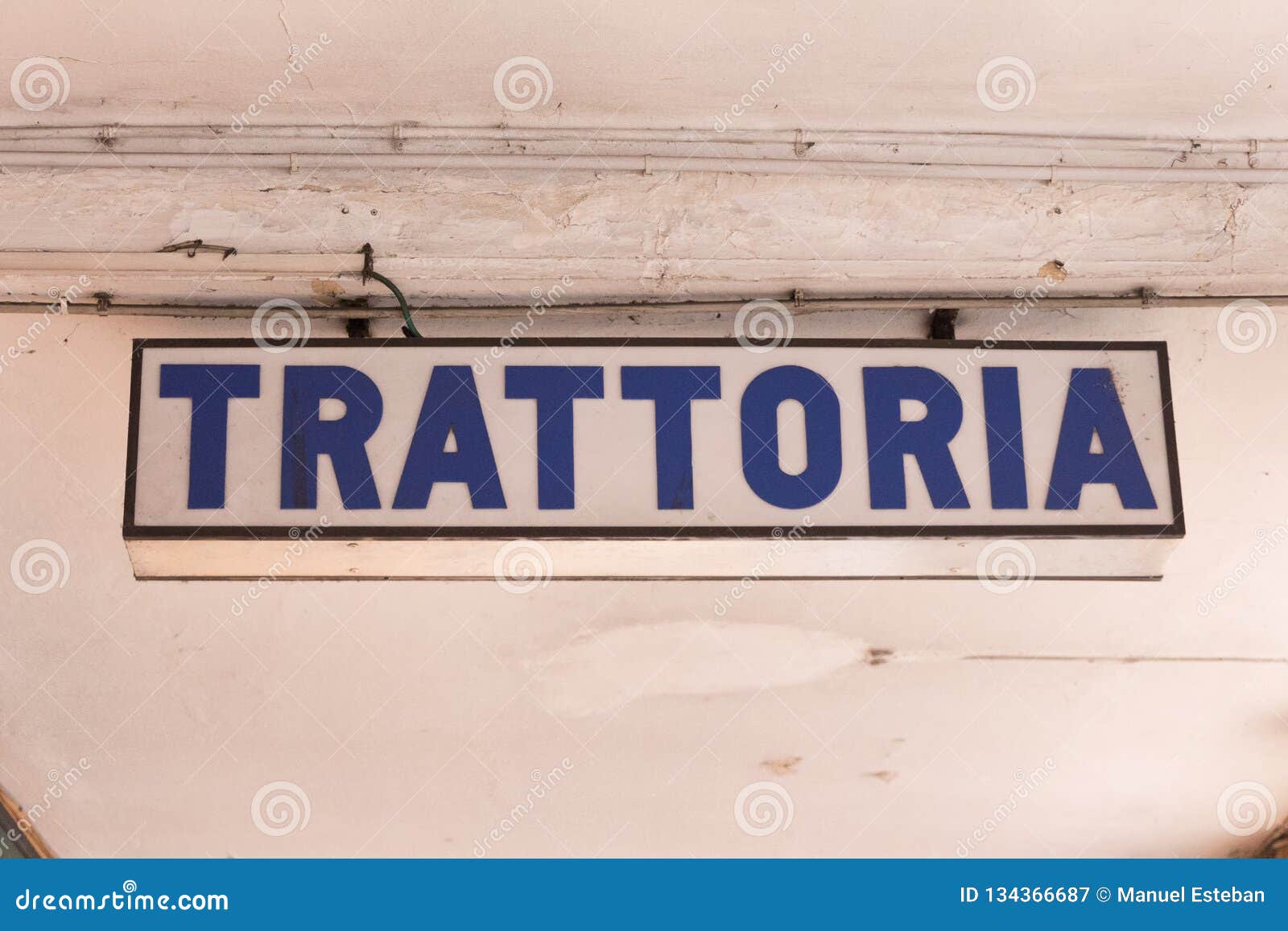  Trattoria Sign  Hanging From The Ceiling In The Street 