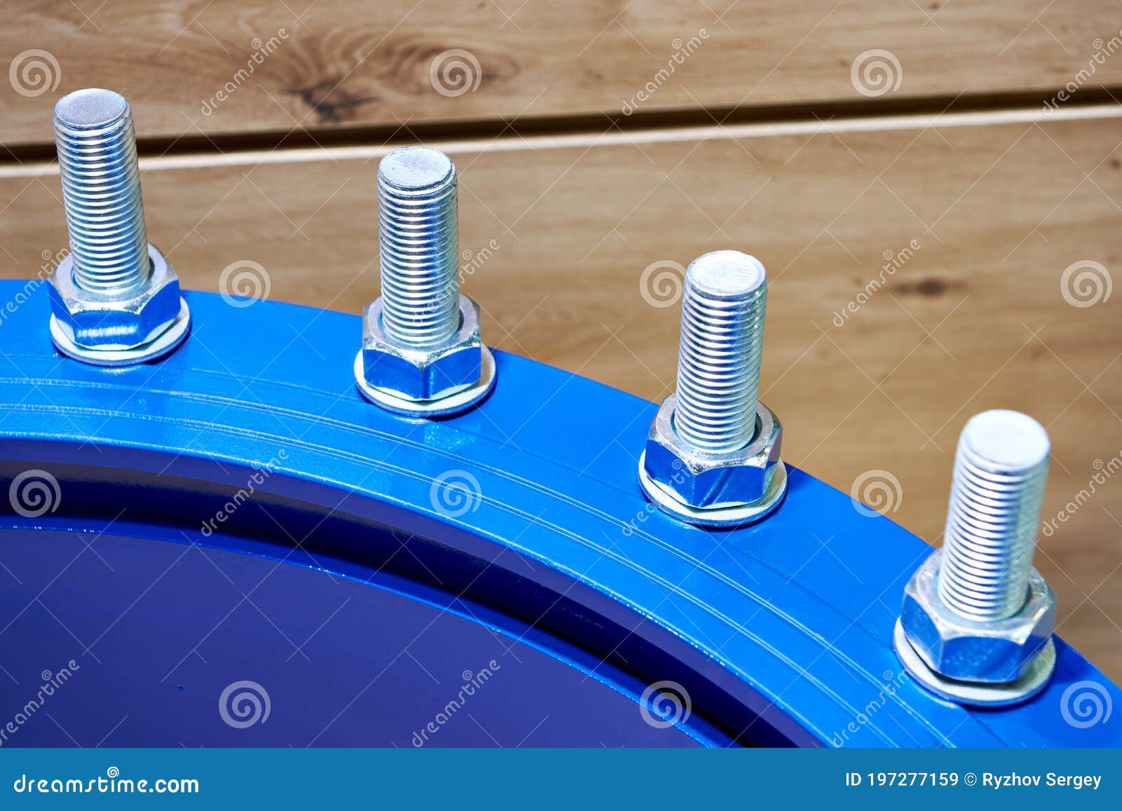 Bolts and Nuts on the Metal Coupling for Water Supply Stock Image