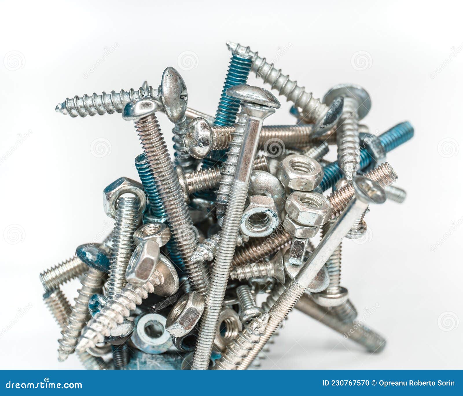 Bolts, nuts and springs stock photo. Image of clockwork 230767570