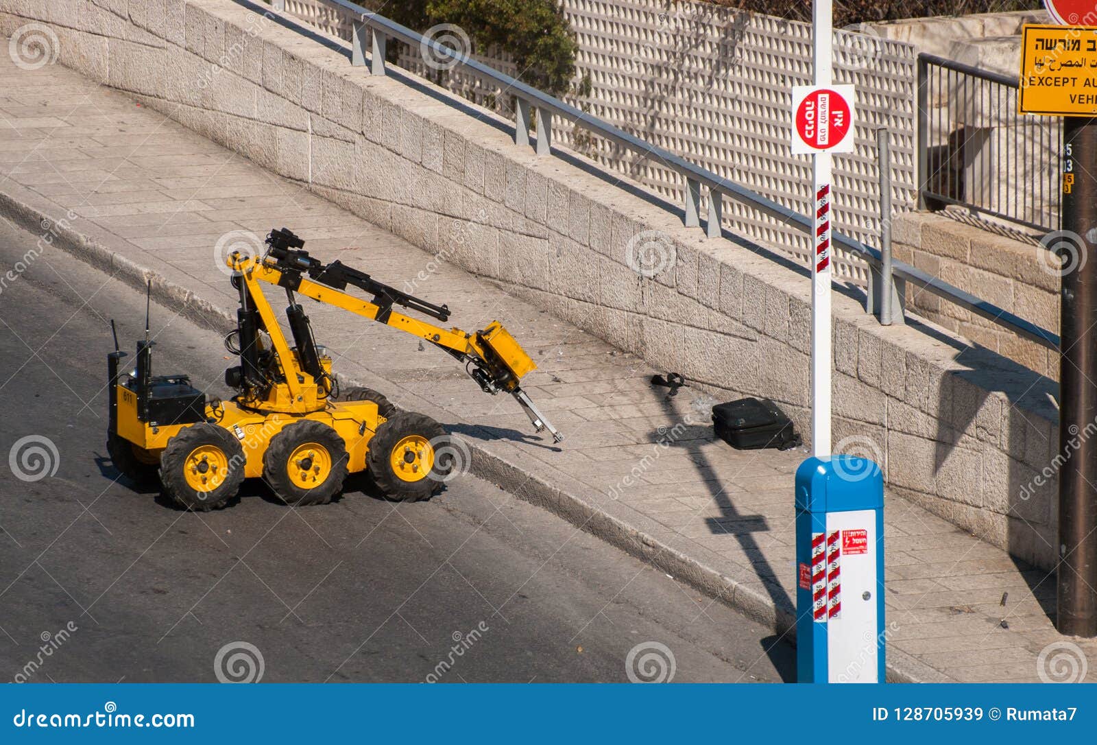 bomb disposal army or police robot check the bag stock image image