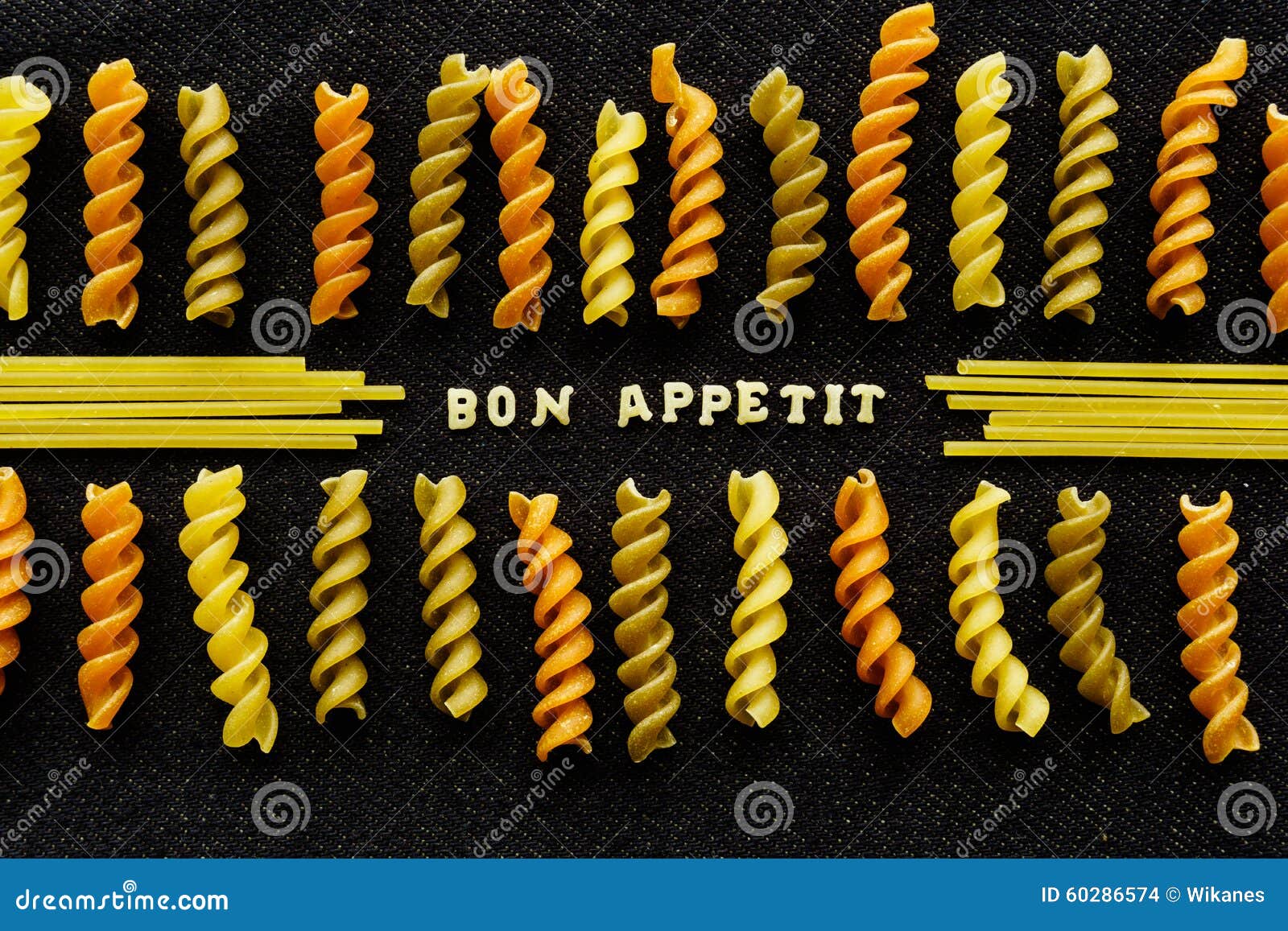 Bon Appetit Page Spelled by Pasta, on Black Stock Photo Image of