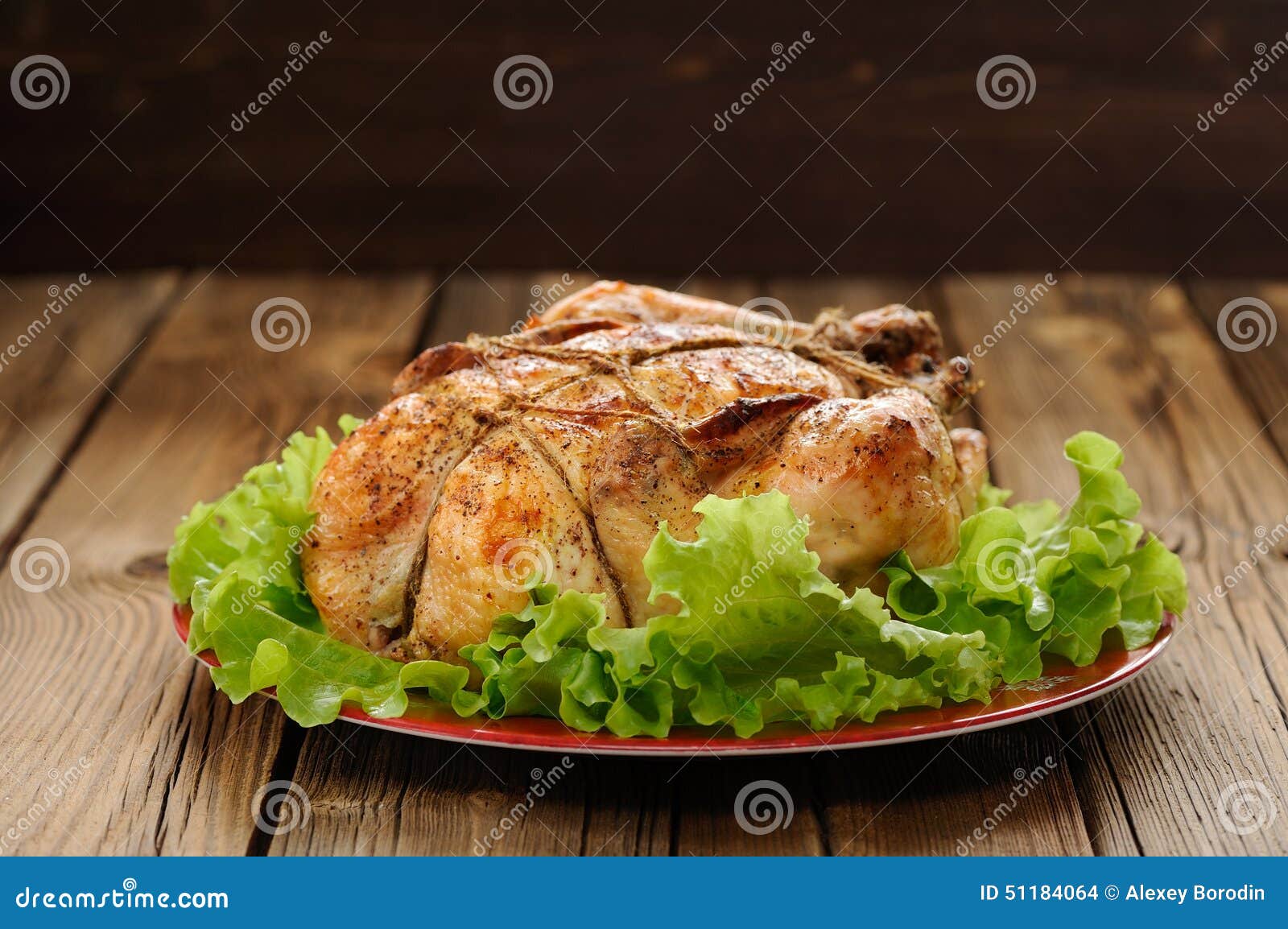 Bondage Shibari Roasted Chicken with Salad Leaves on Red Plate O Stock ...