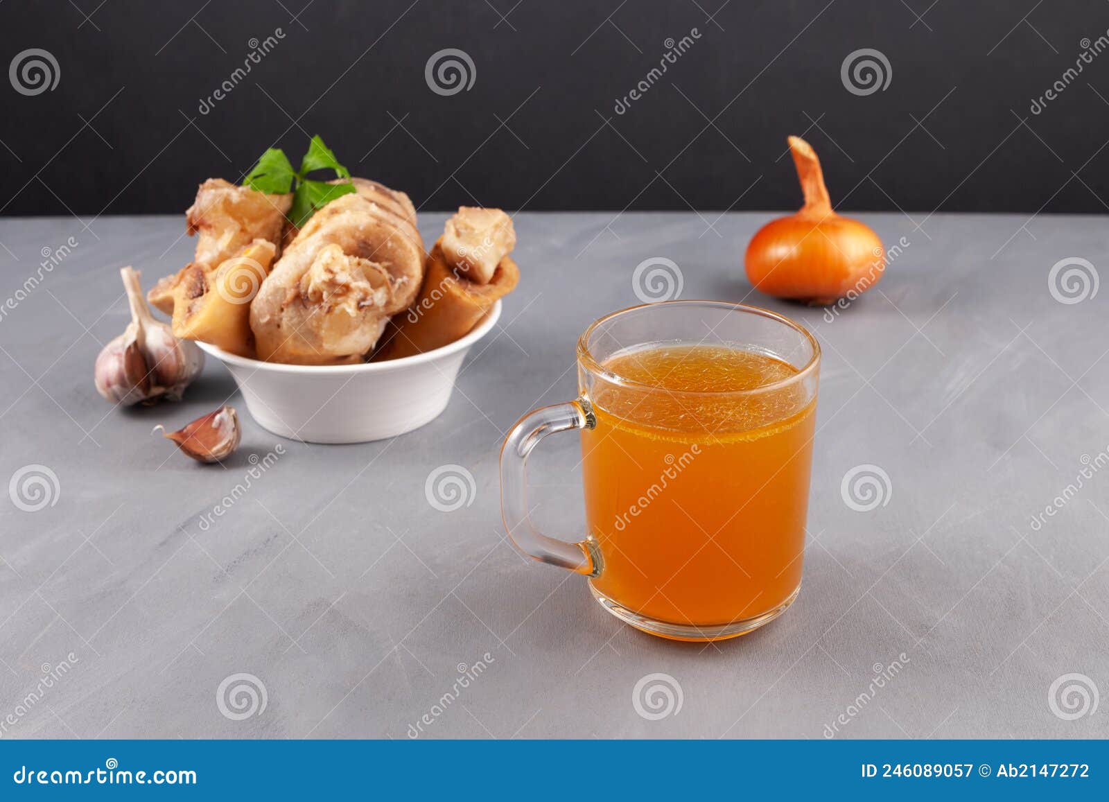 Bone Broth in Transparent Mug, Beef Bones are Source of Natural