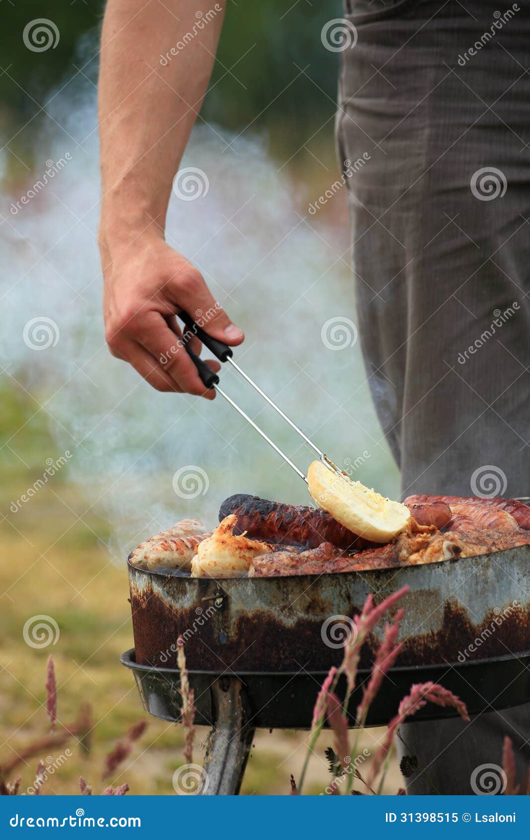 Bonfire Campfire Fire Flames Grilling Steak on the BBQ Stock Image