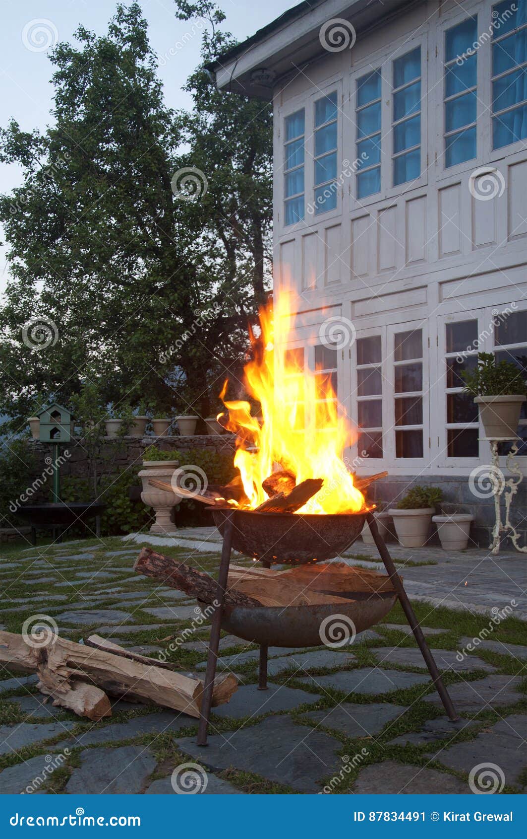 A Bonfire in a Courtyard in the Mountains Stock Image Image of logs