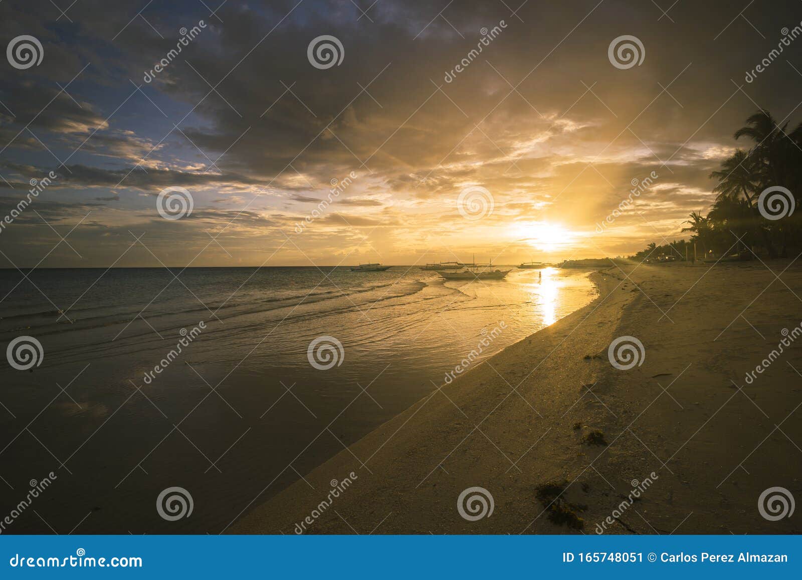  sunset on a beach on bantayan island.