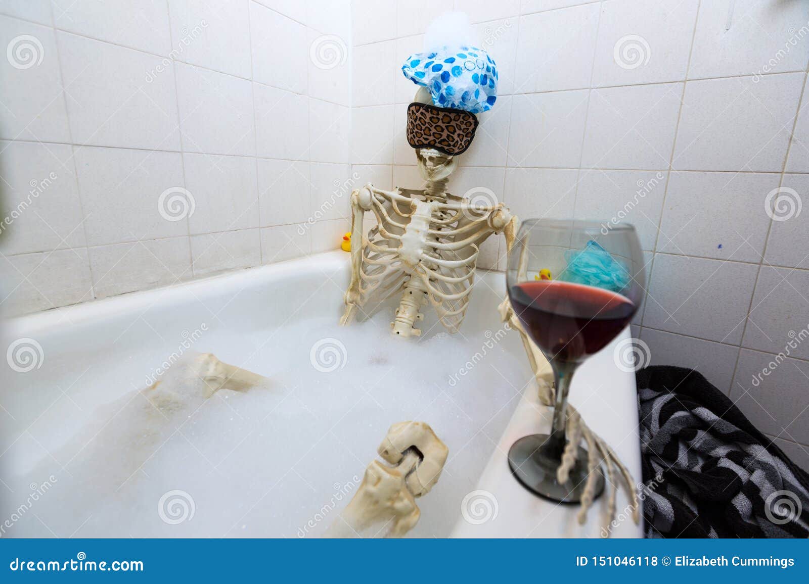 Bony Skeleton Taking A Bubble Bath In A Grungy Off White