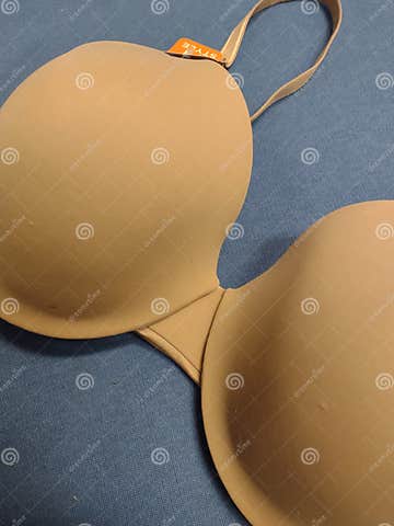 Boobs cup bra tan stock photo. Image of yellow, hand - 227317072