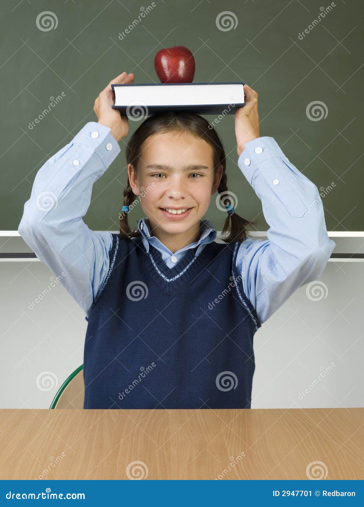 With book on head stock image. Image of girl, children 2947701
