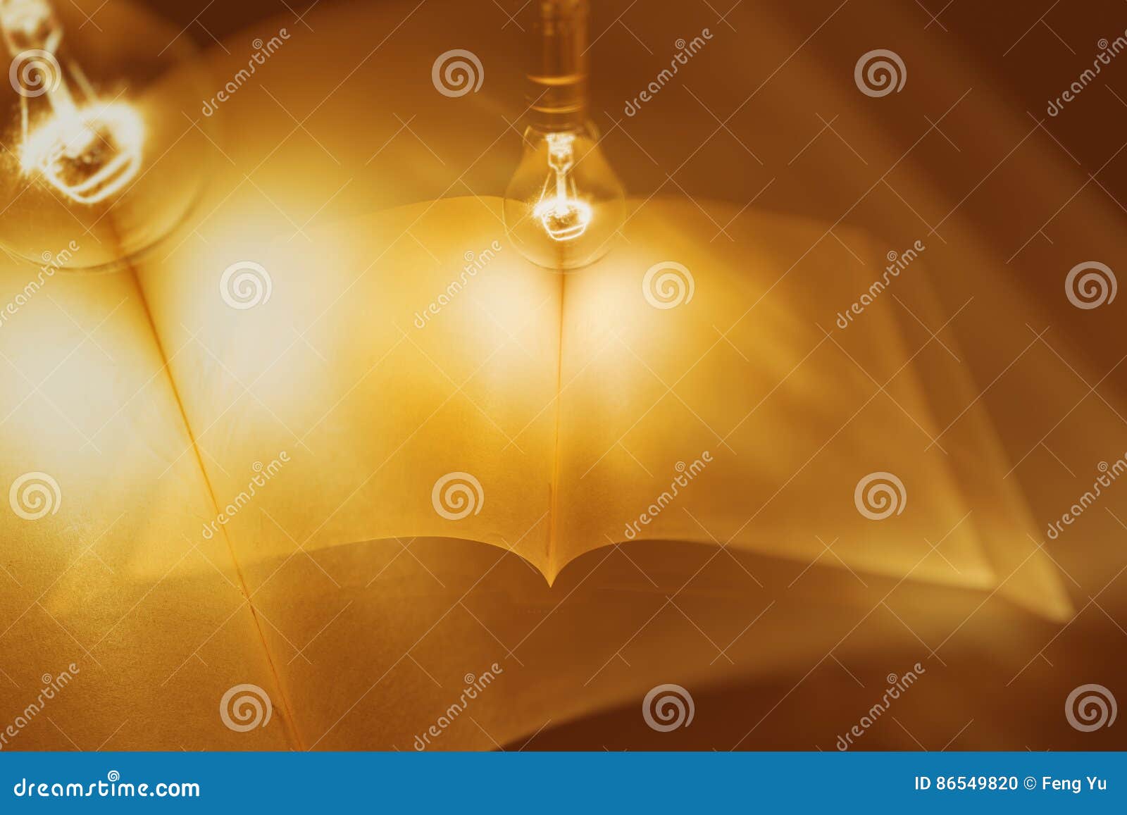 Book and light bulb stock photo. Image of light, business 86549820