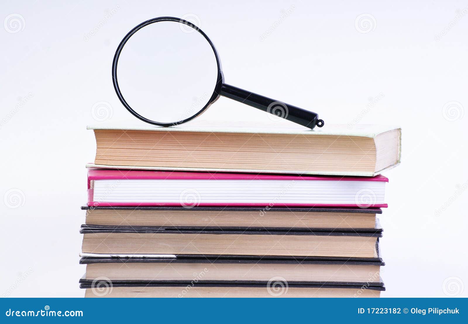 Book with magnifying glass stock photo. Image of book 17223182