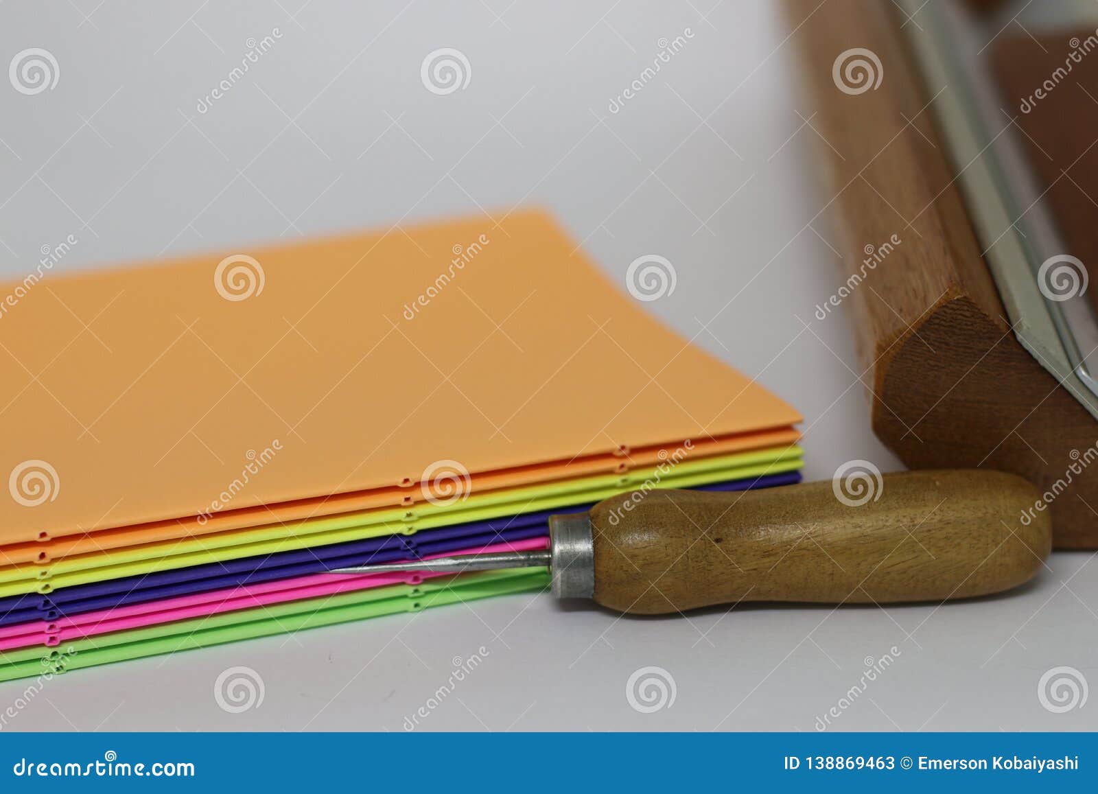 The bookbinding process stock image. Image of book, punch 138869463