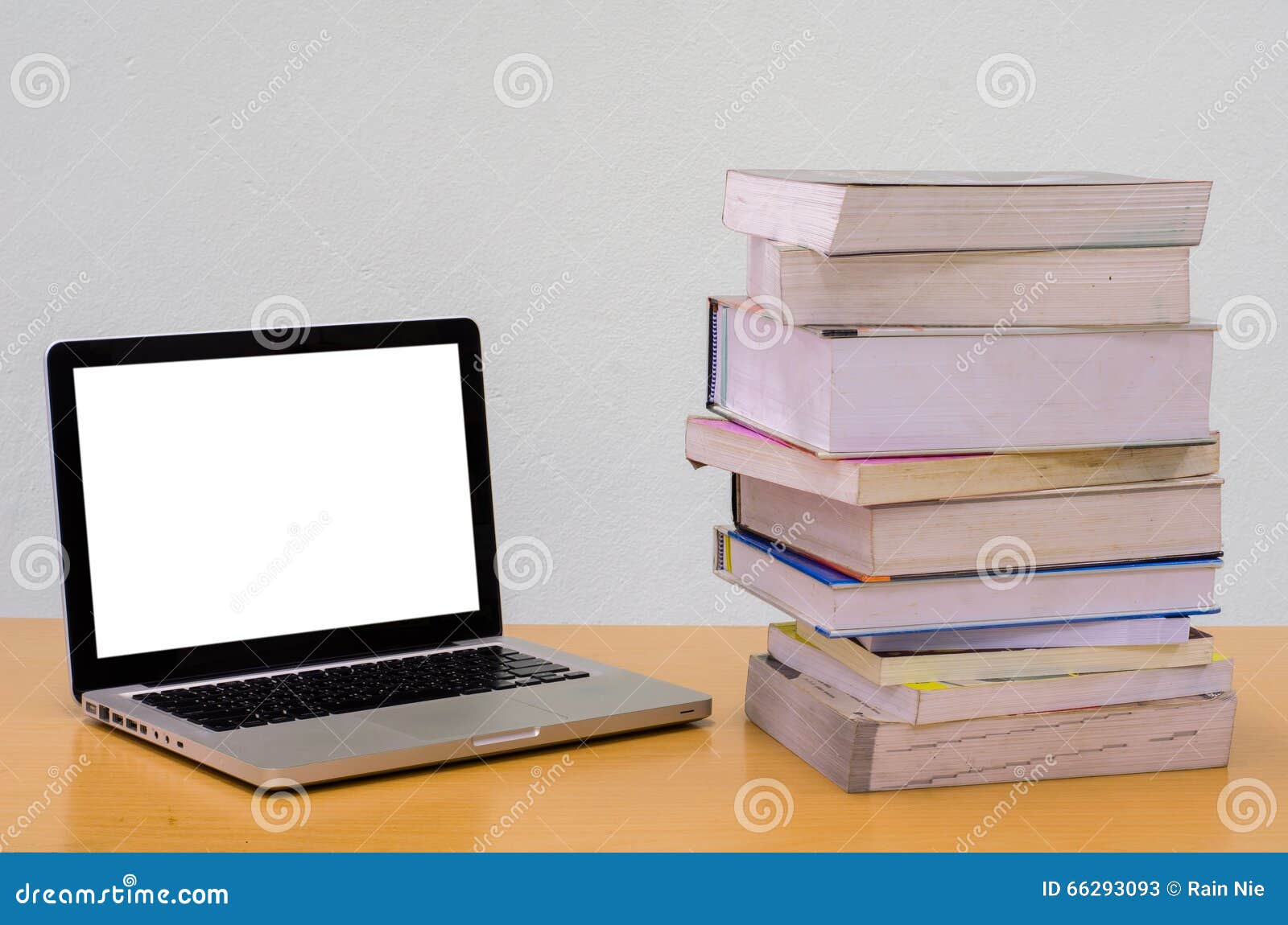 Books with Notebook (laptop) on Wood Table, Education, Thesis,essay