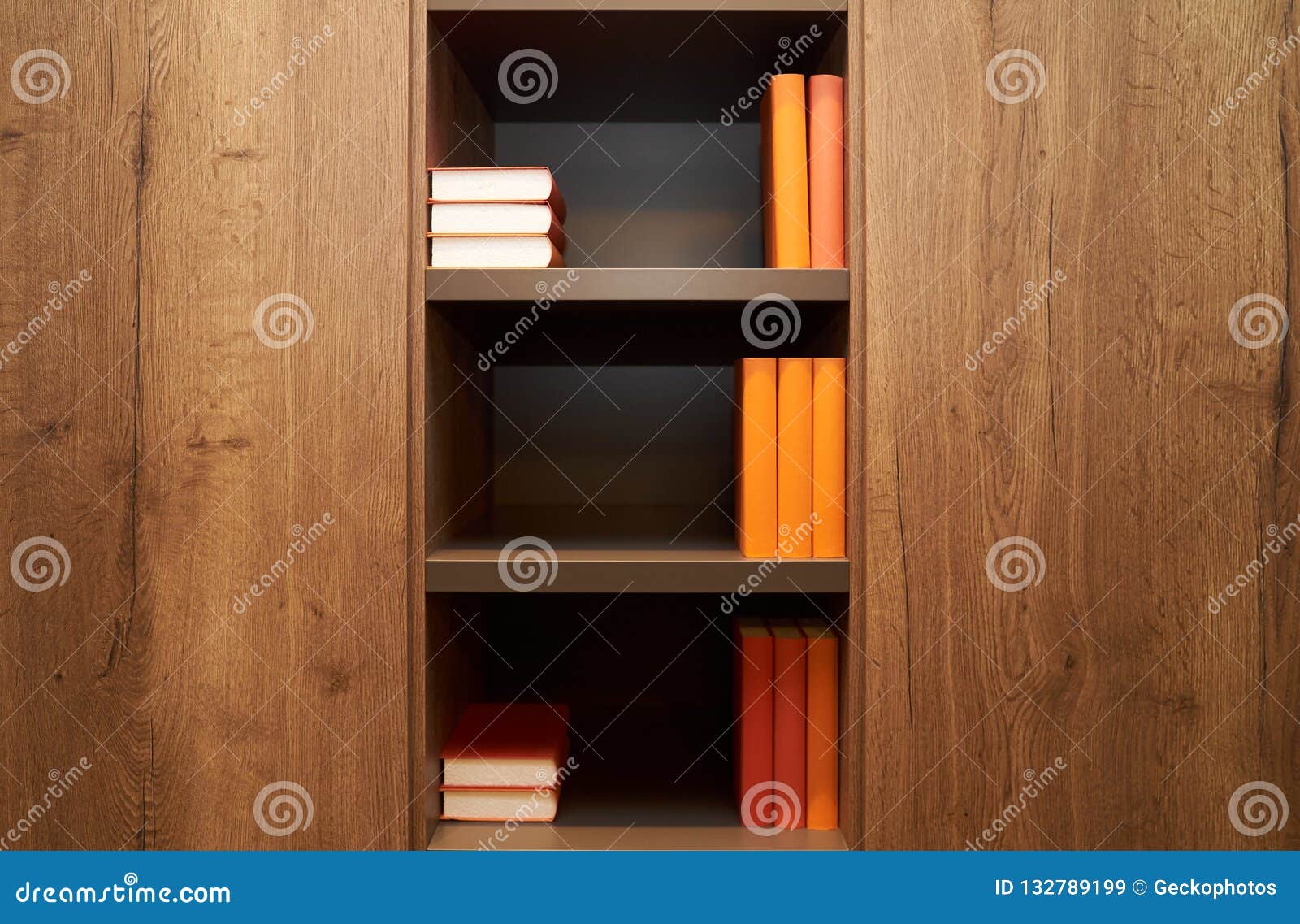 Bookshelf With Books In Modern Library Office Interior Close Up