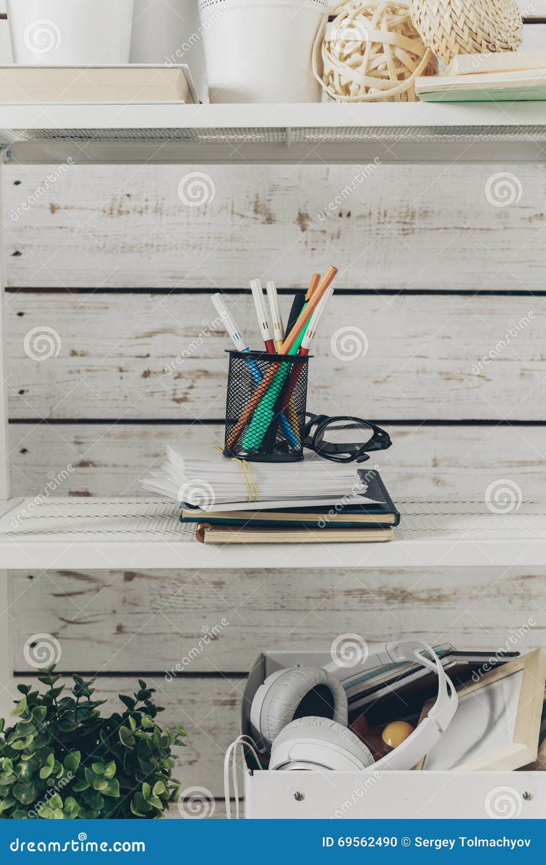 Bookshelf with Office Supplies Stock Photo Image of lantern, decor