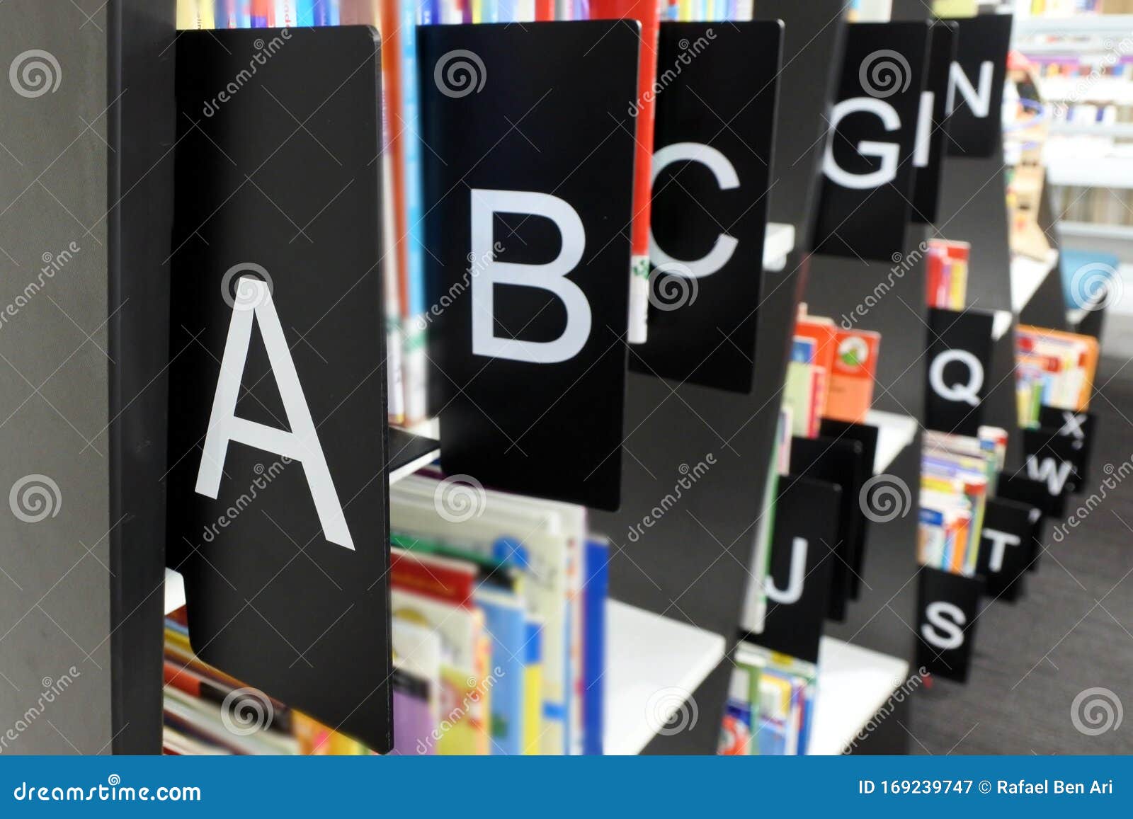 bookshelf organized by alphabetical order