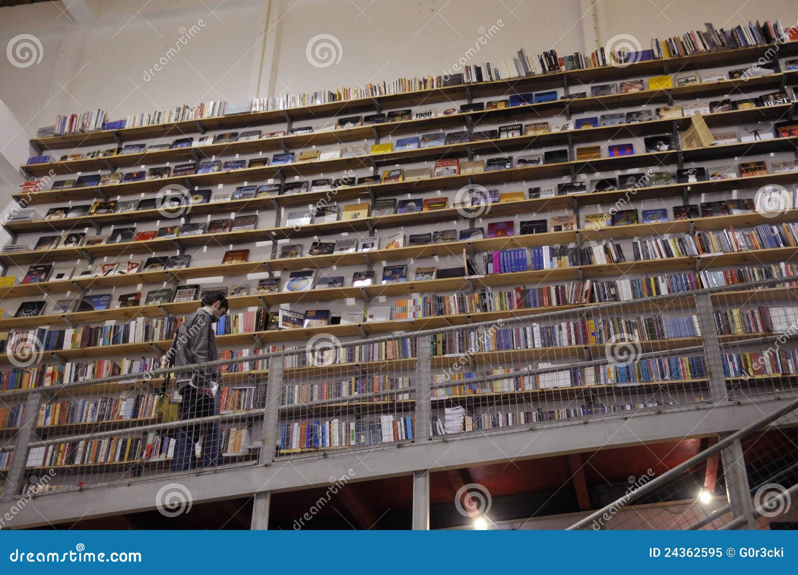 Bookstore High Shelves with Books Young Man Editorial Image Image