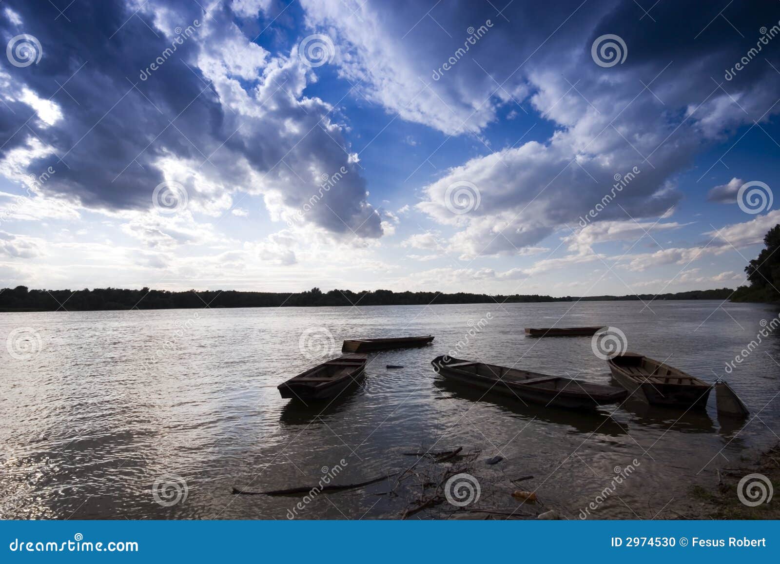 Boot in the river stock photo. Image of solitude, horizon 2974530
