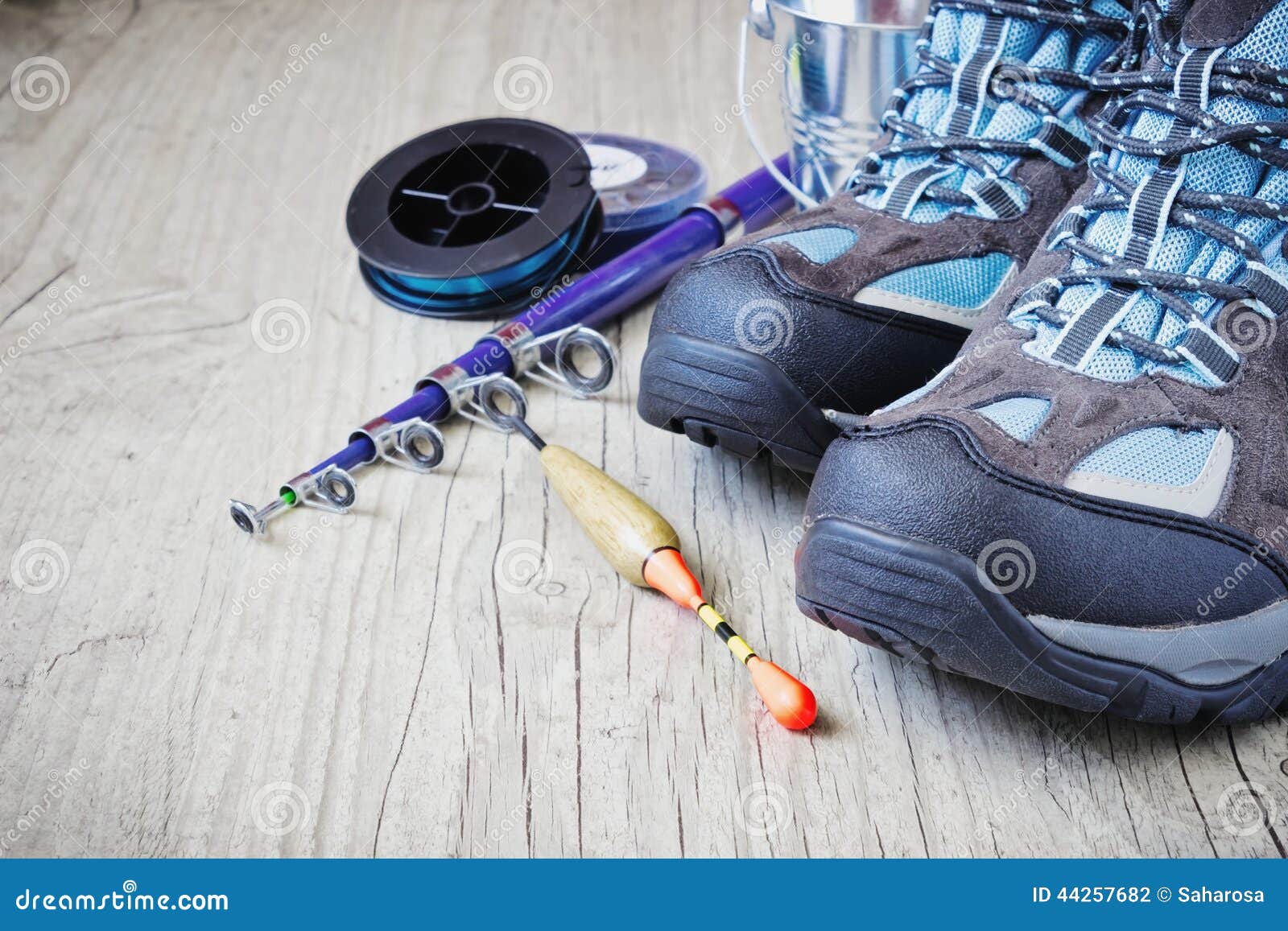 Boots and fishing gear stock photo. Image of fishing - 44257682