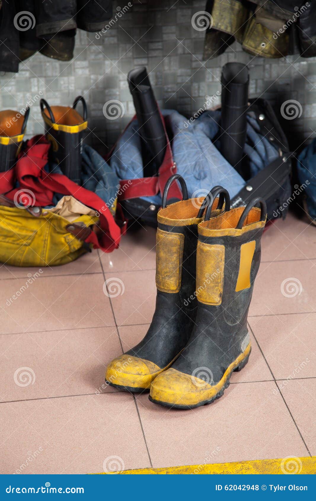 Boots On Floor At Fire Station Stock 