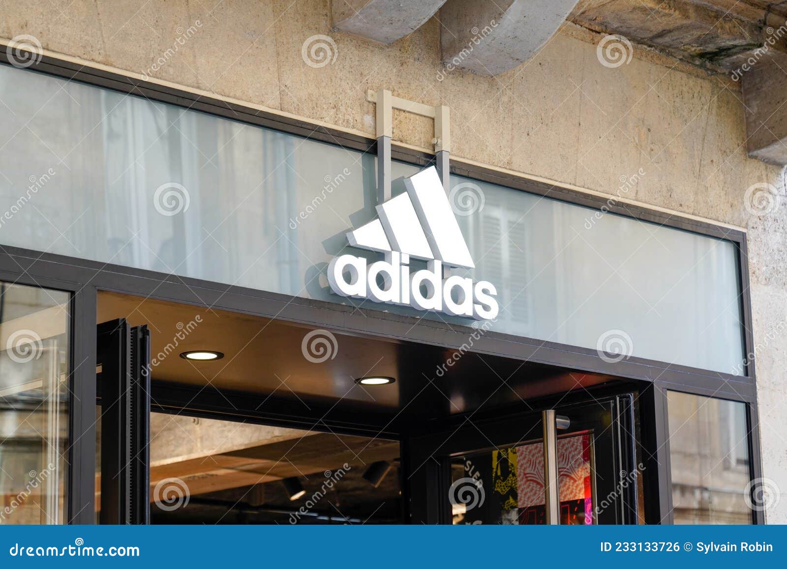 Adidas Logo Sign and Text Front of Sporty Shop Shoes Boutique Sport Footwear Editorial Photo - Image of clothes, clothing: 233133726
