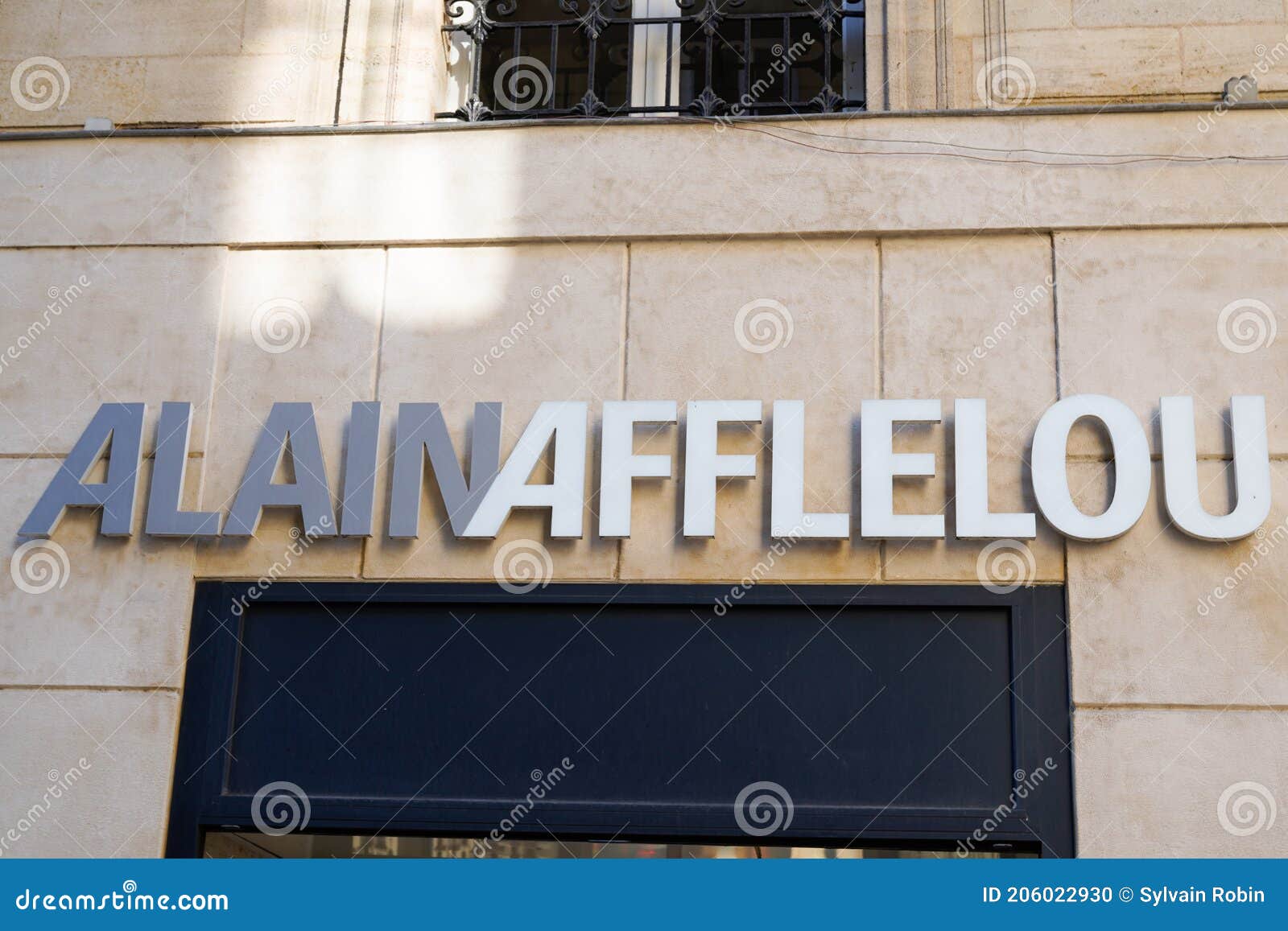 Alain Afflelou Text Brand and Sign Logo of Optical Store Front Shop ...