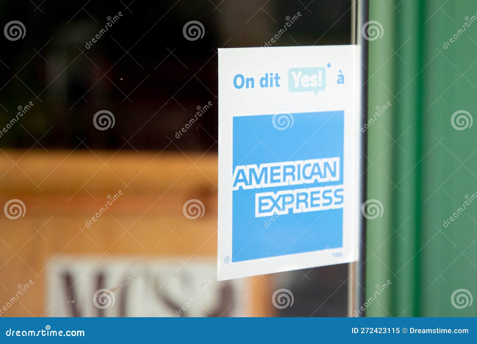 Amex American Express Logo Brand and Text Sign on Entrance Windows