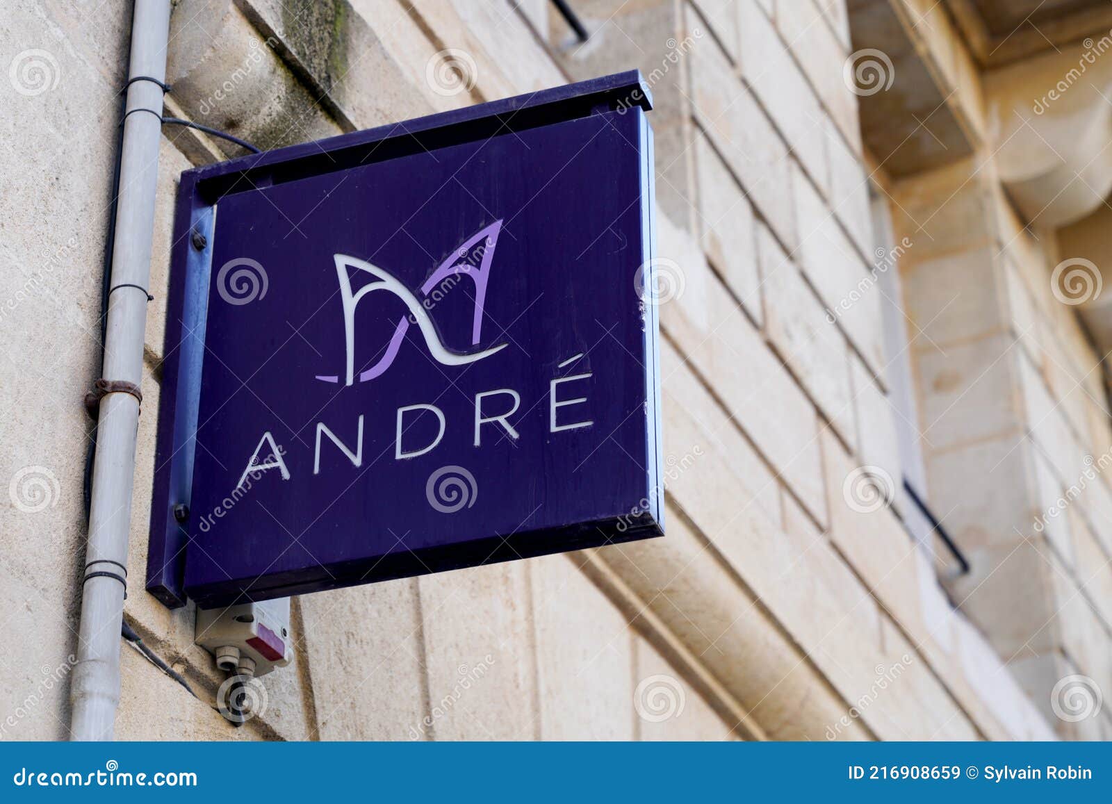 Andre Sign Brand and Text Logo Shoes Store Fashion Apparel and Footwear ...