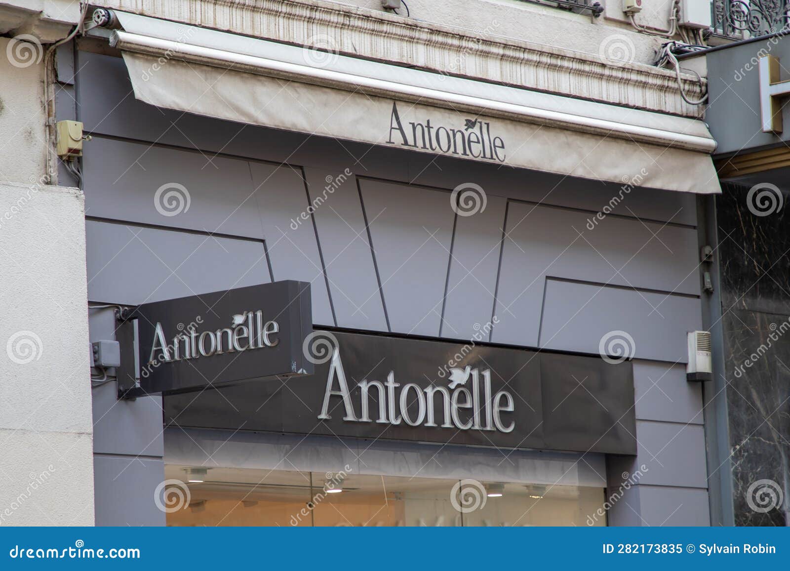 Antonelle Logo Brand and Sign Text Front Entrance Wall Facade Store ...