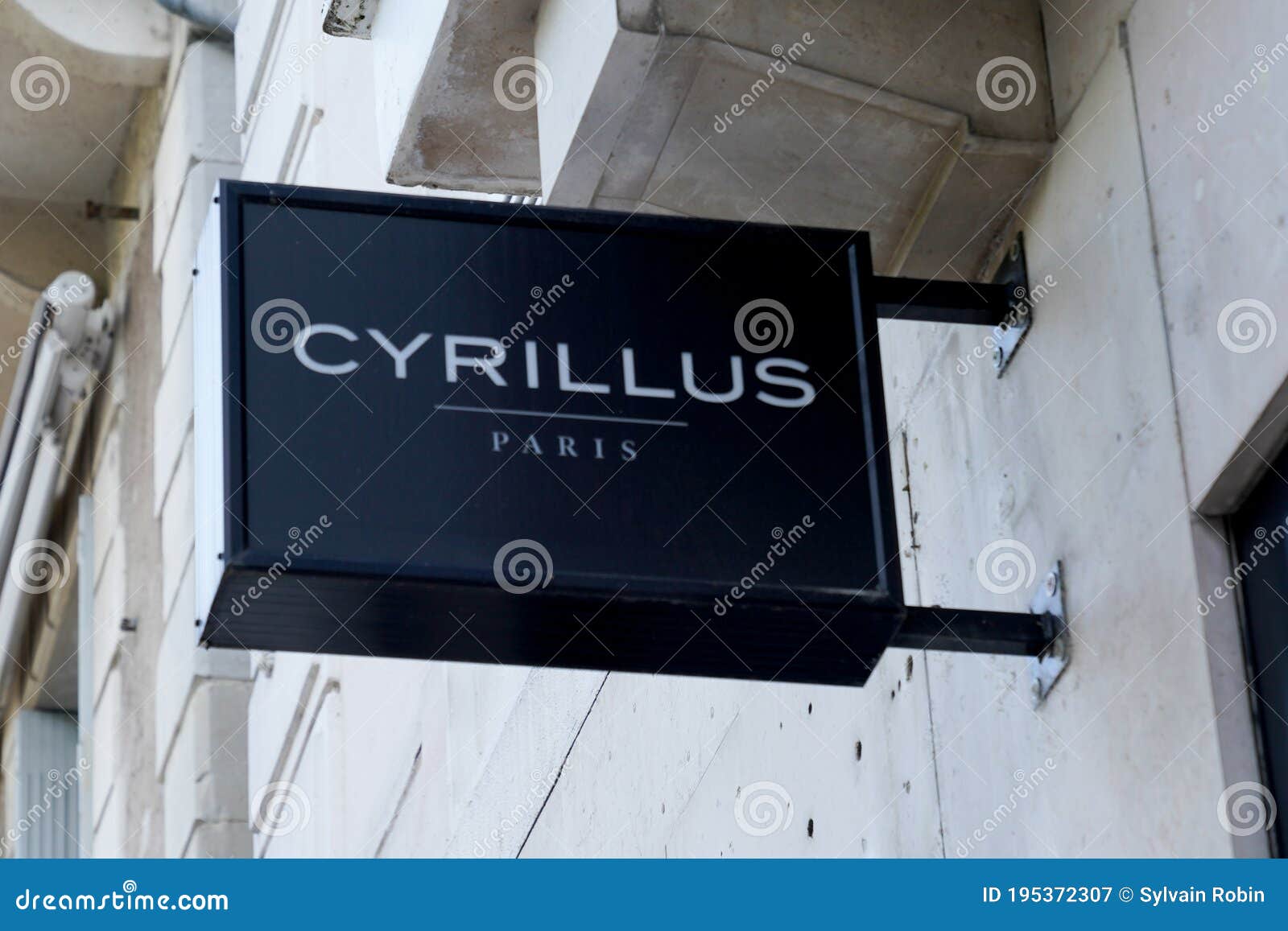 Cyrillus Logo and Text Sign Front of Store Men Clothing Shop Brand ...